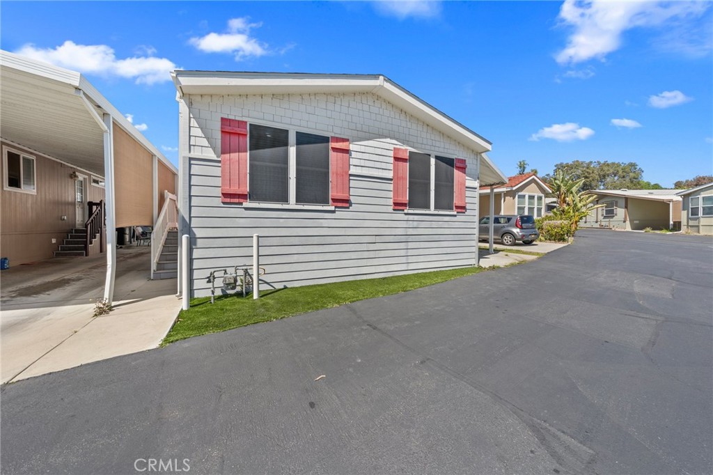 3909 Reche Road, Unit 194 Fallbrook, CA 92028 - Photo 5 of 37 a view of a house with a patio