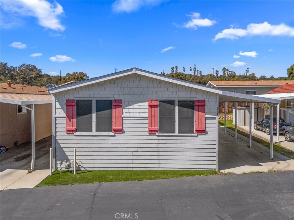 3909 Reche Road, Unit 194 Fallbrook, CA 92028 - Photo 7 of 37 a view of a house with a patio
