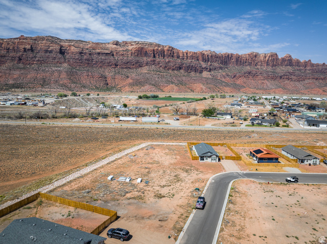 212 Lidia Circle, Unit 17 Moab, UT 84532 - Photo 7 of 24 Newly constructed residential development featuring a paved cul-de-sac and individual property fencing