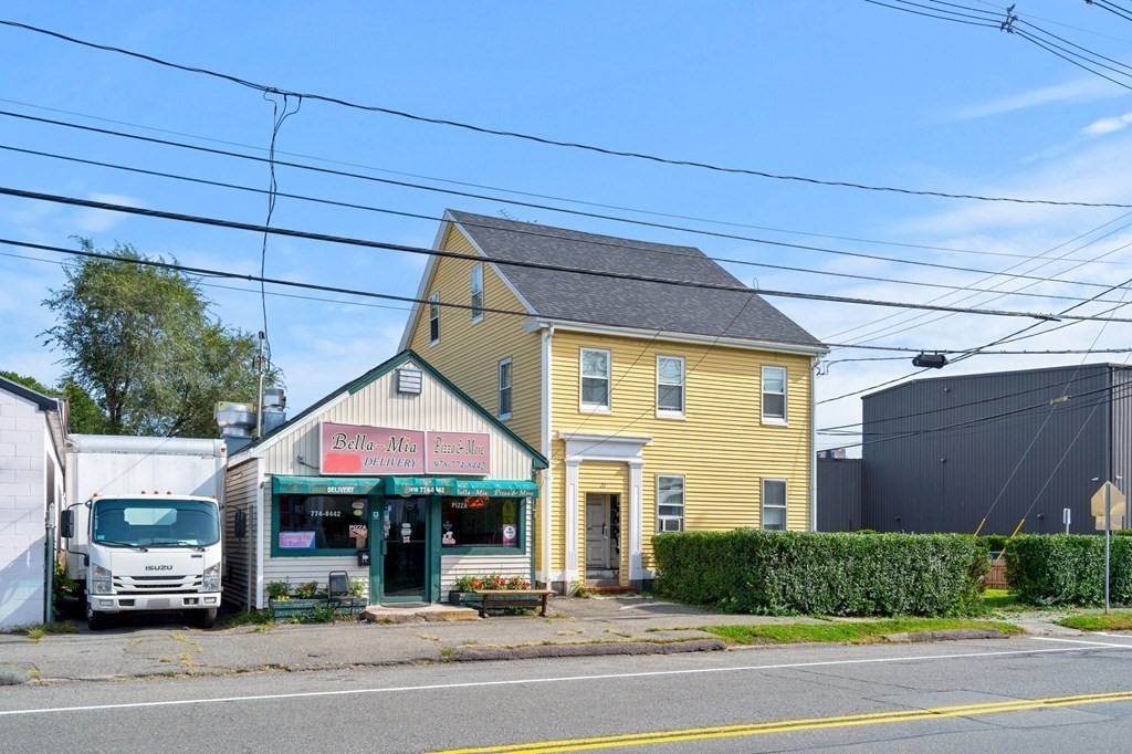 20 Water Street Danvers, MA 01923 - Photo 4 of 33 a front view of a building with parking space and parking space