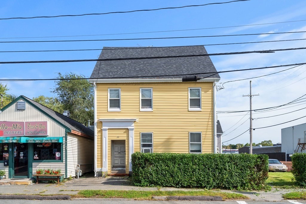 20 Water Street Danvers, MA 01923 - Photo 5 of 33 a front view of a house with a yard