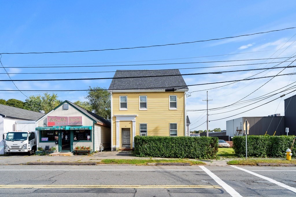 20 Water Street Danvers, MA 01923 - Photo 7 of 33 a front view of a building with a garden