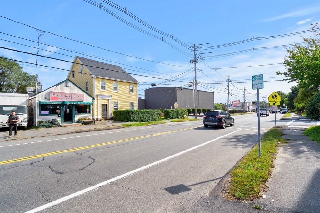 20 Water Street Danvers, MA 01923 - Photo 8 of 33 a car parked in front of a building