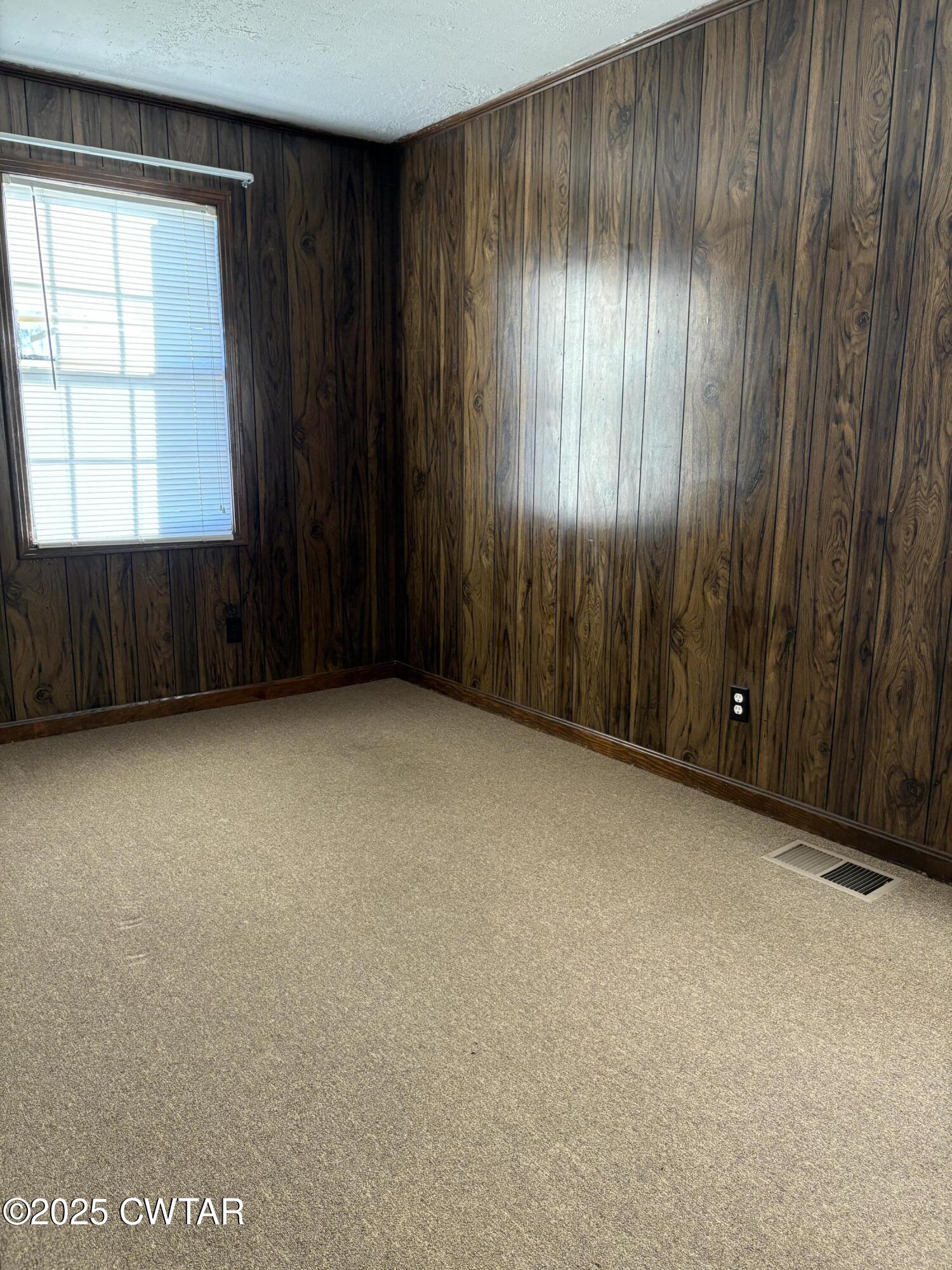 115 Jaynes Road Bells, TN 38006 - Photo 13 of 19 an empty room with windows