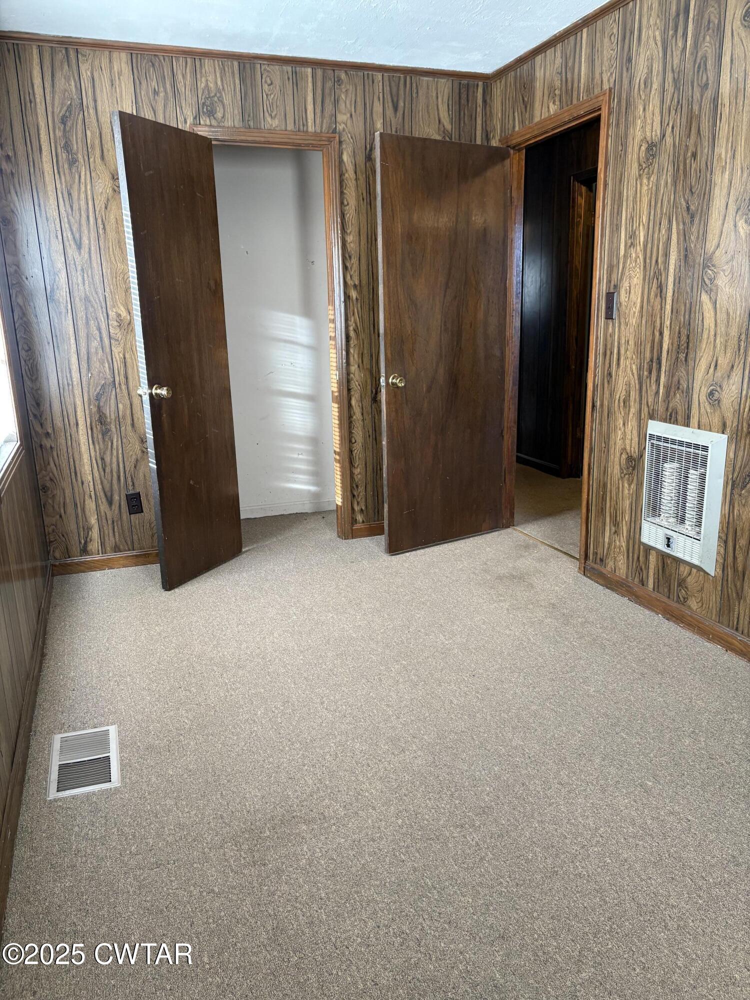 115 Jaynes Road Bells, TN 38006 - Photo 14 of 19 a view of an empty room with closet and wooden floor