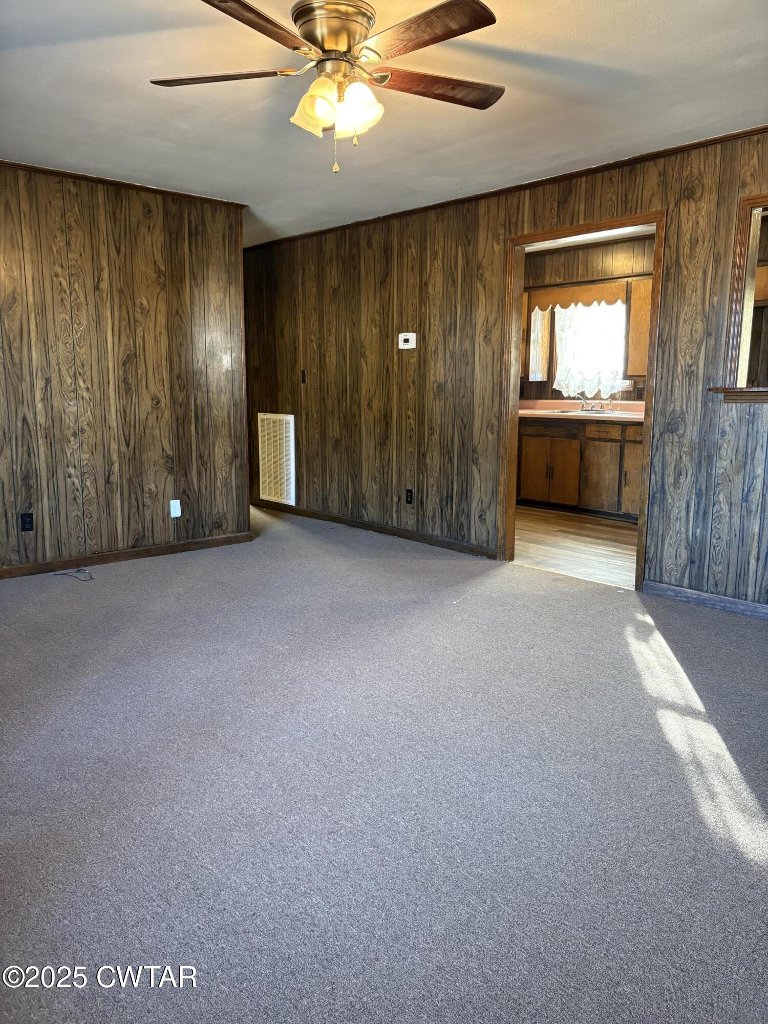 115 Jaynes Road Bells, TN 38006 - Photo 5 of 19 a view of an empty room with a window