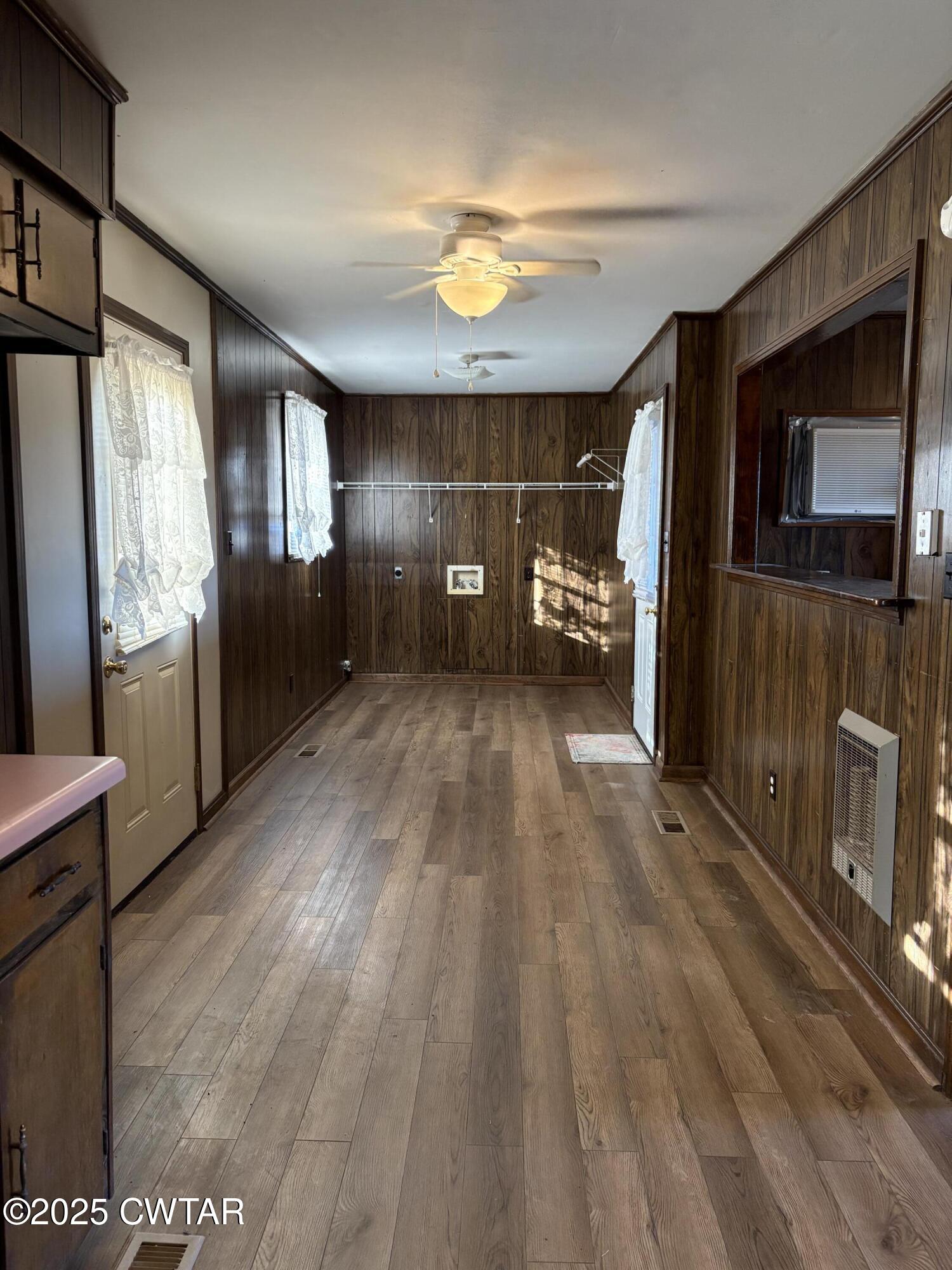 115 Jaynes Road Bells, TN 38006 - Photo 6 of 19 a view of empty room with wooden floor and fan