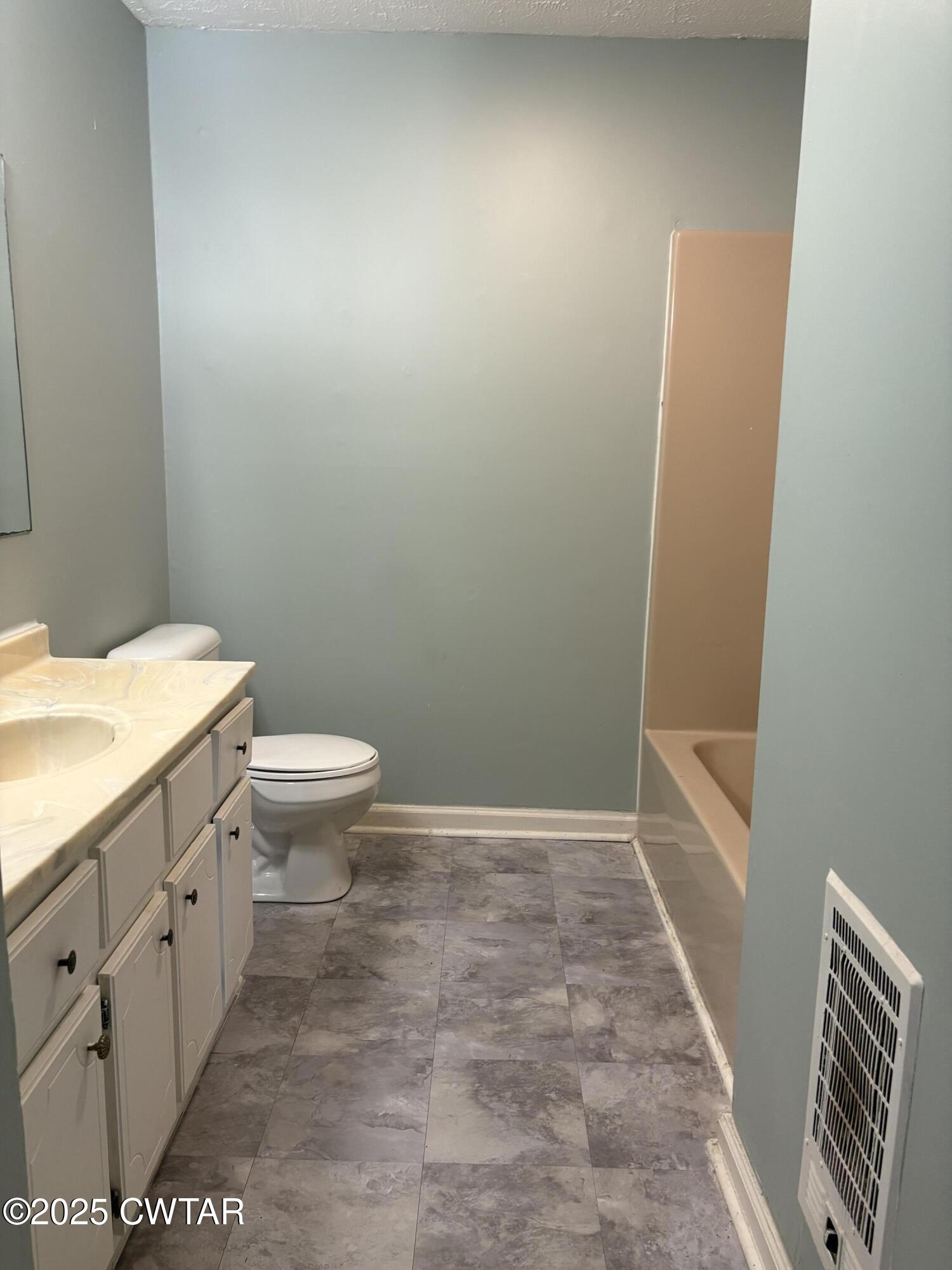 115 Jaynes Road Bells, TN 38006 - Photo 9 of 19 a bathroom with a sink and a toilet