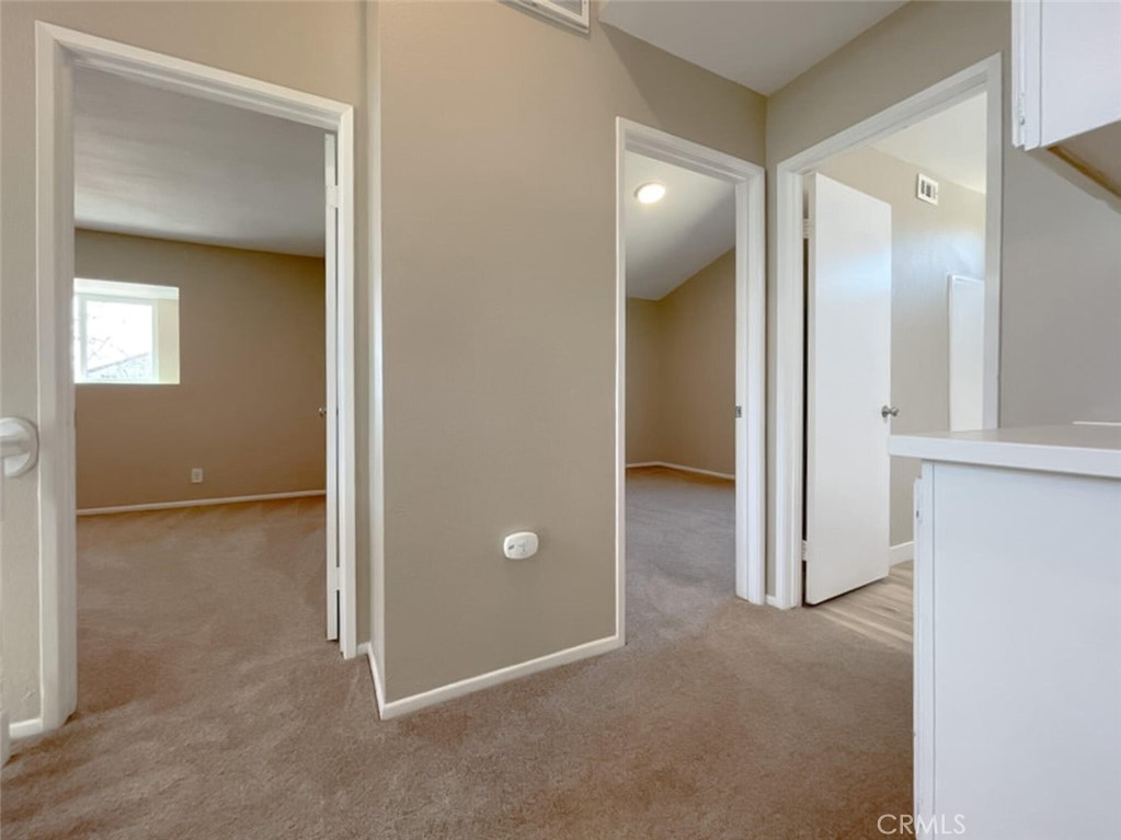 43856 Windsor Place Lancaster, CA 93536 - Photo 26 of 39 an empty room with closet and a bathroom
