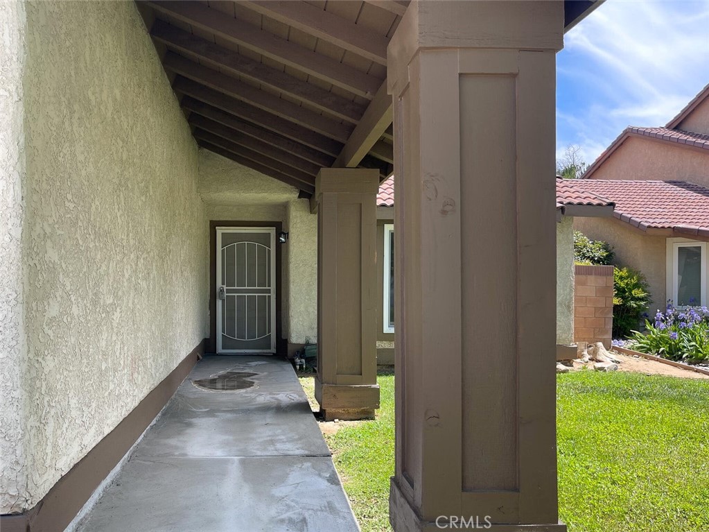 43856 Windsor Place Lancaster, CA 93536 - Photo 4 of 39 a view of a hallway with a backyard