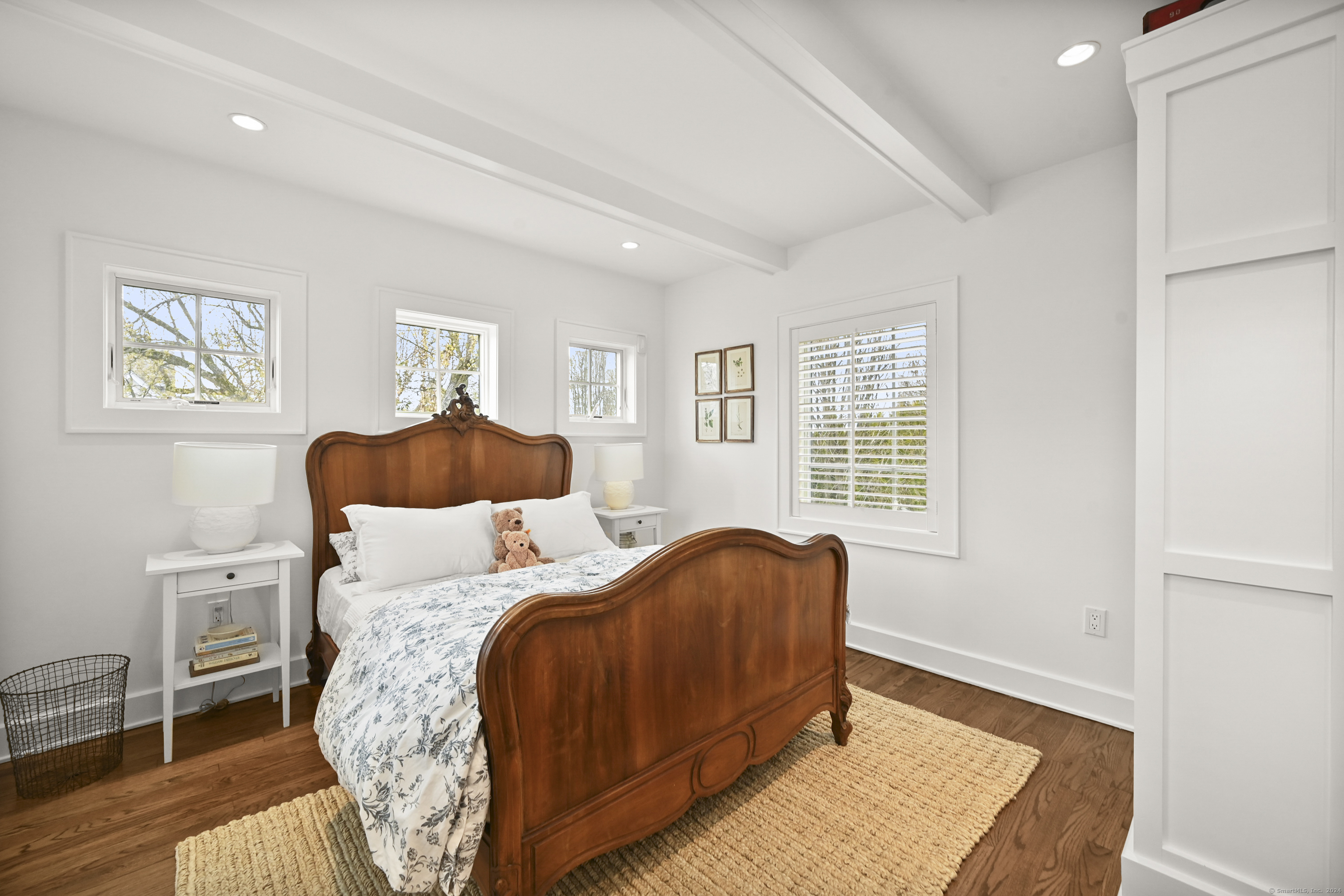 104 Roton Avenue Norwalk, CT 06853 - Photo 28 of 40 a bedroom with a bed and a window