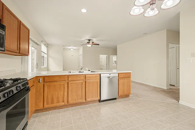 a spacious bathroom with a sink a mirror and a vanity
