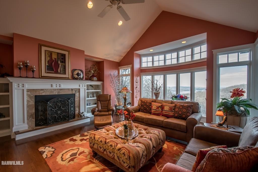 8622 Fisher Road Galena, IL 61036 - Photo 3 of 7 a living room with furniture and a fireplace