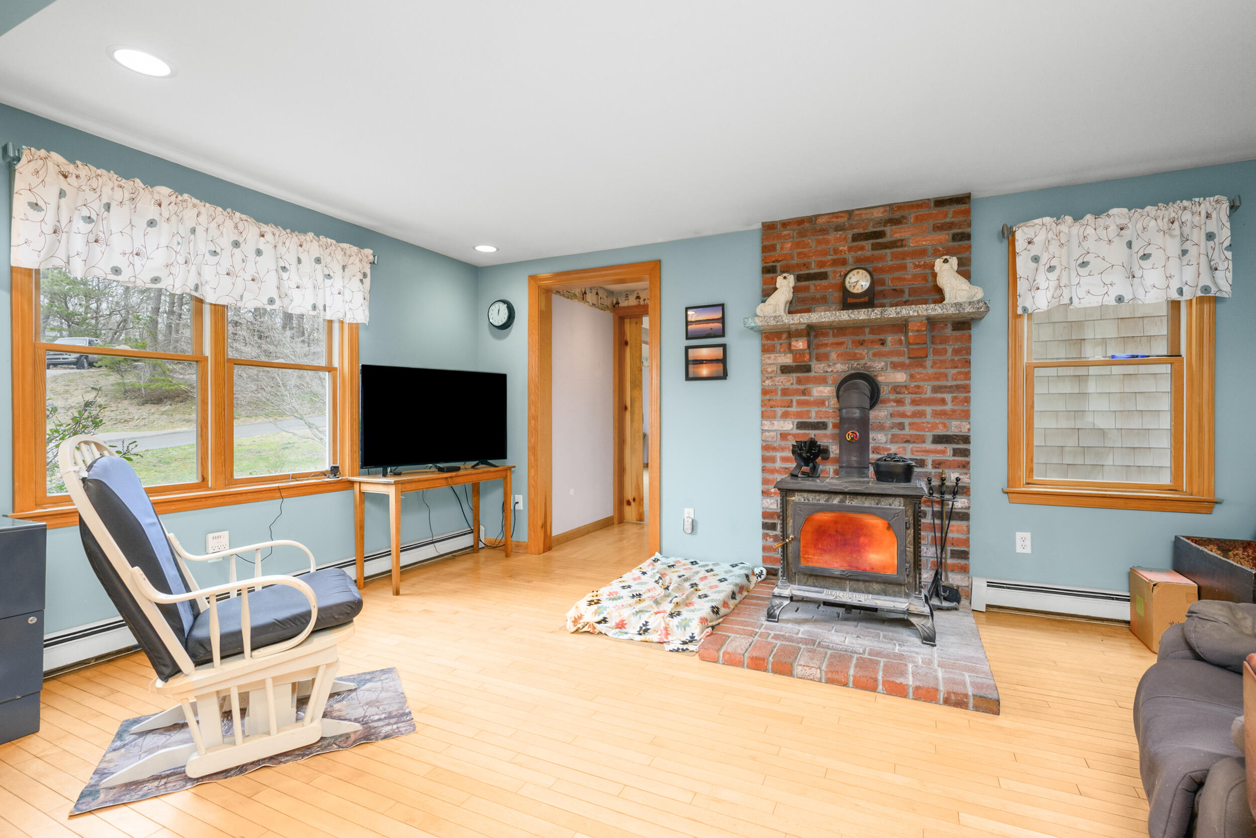 2 Short Lots Lane Truro, MA 02666 - Photo 24 of 61 a living room with furniture a flat screen tv and a floor to ceiling window