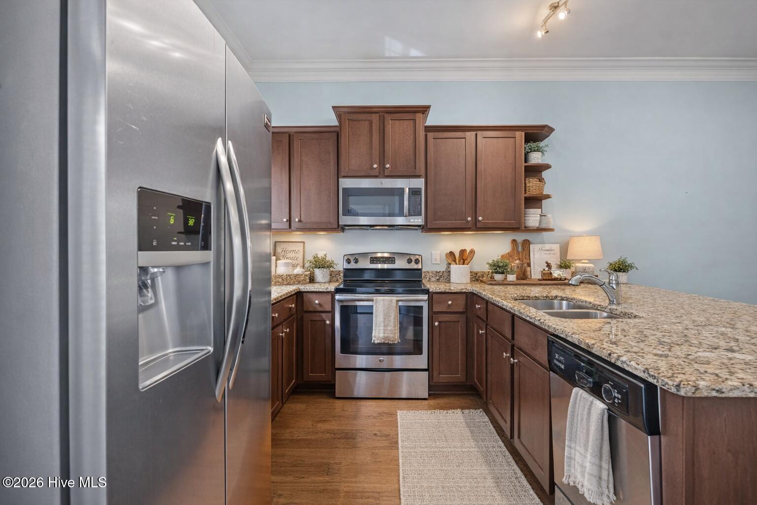 4916 Exton Park Loop Castle Hayne, NC 28429 - Photo 5 of 36 Warm and inviting kitchen details