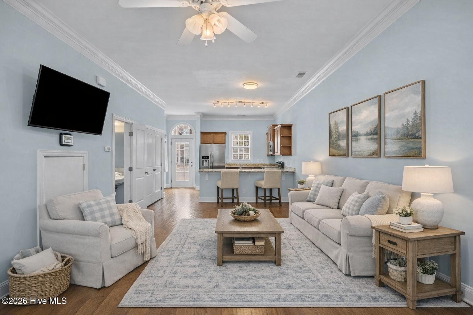 4916 Exton Park Loop Castle Hayne, NC 28429 - Photo 8 of 36 Serene living room with countryside artw
