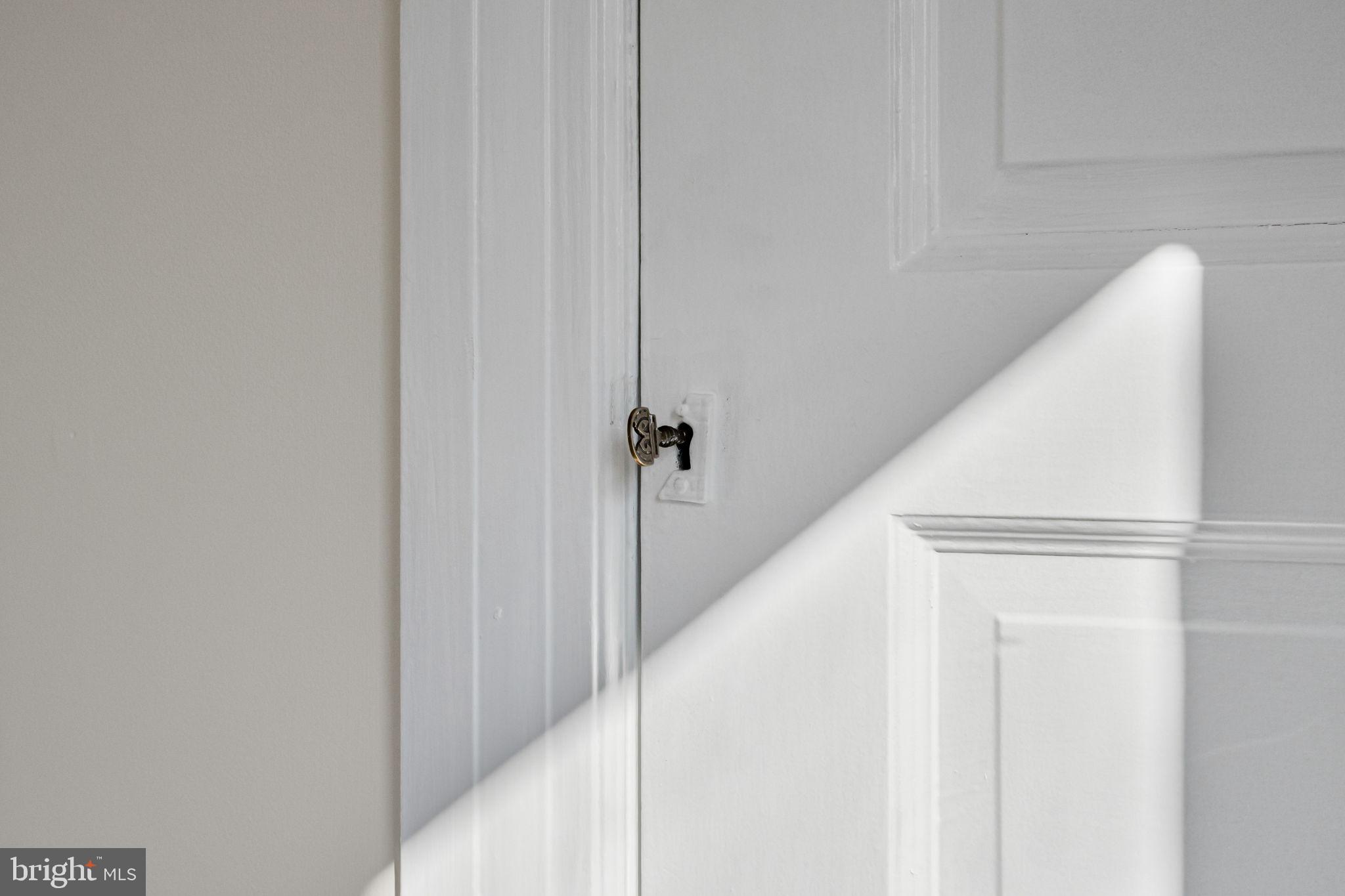 208 South Pennell Road Media, PA 19063 - Photo 33 of 46 Hallway linen closet with antique key
