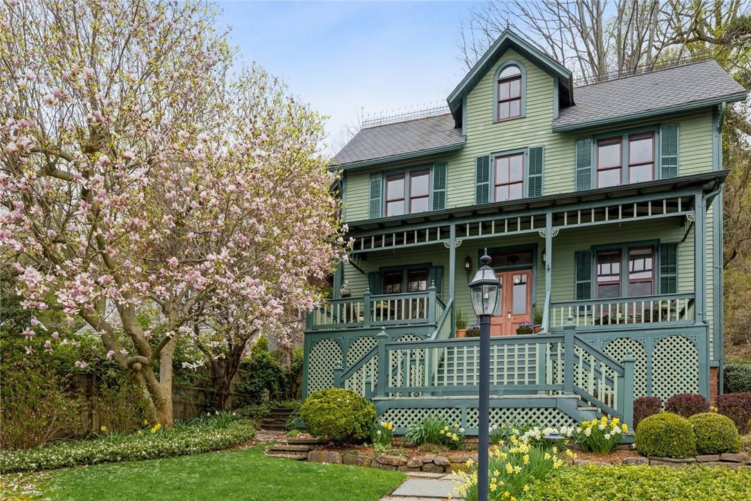 307 River Road Nyack, NY 10960 - Photo 1 of 1 a front view of a house with a garden and plants