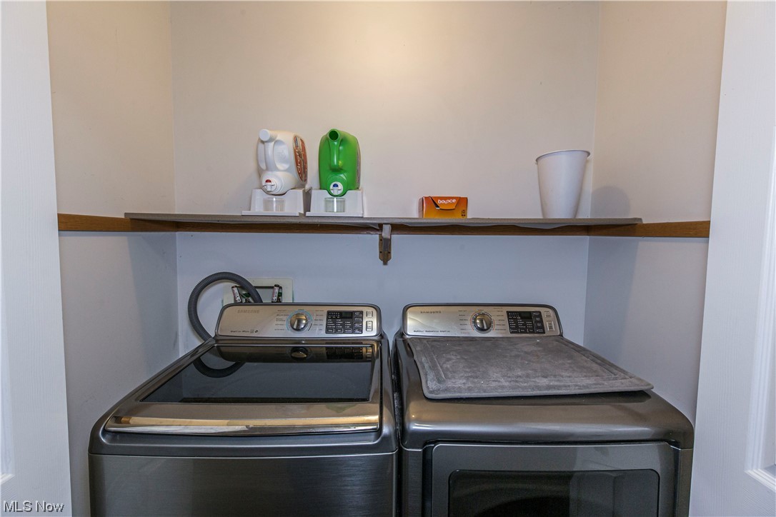 1804 Grace Road Akron, OH 44312 - Photo 11 of 15 Washroom with washer and dryer