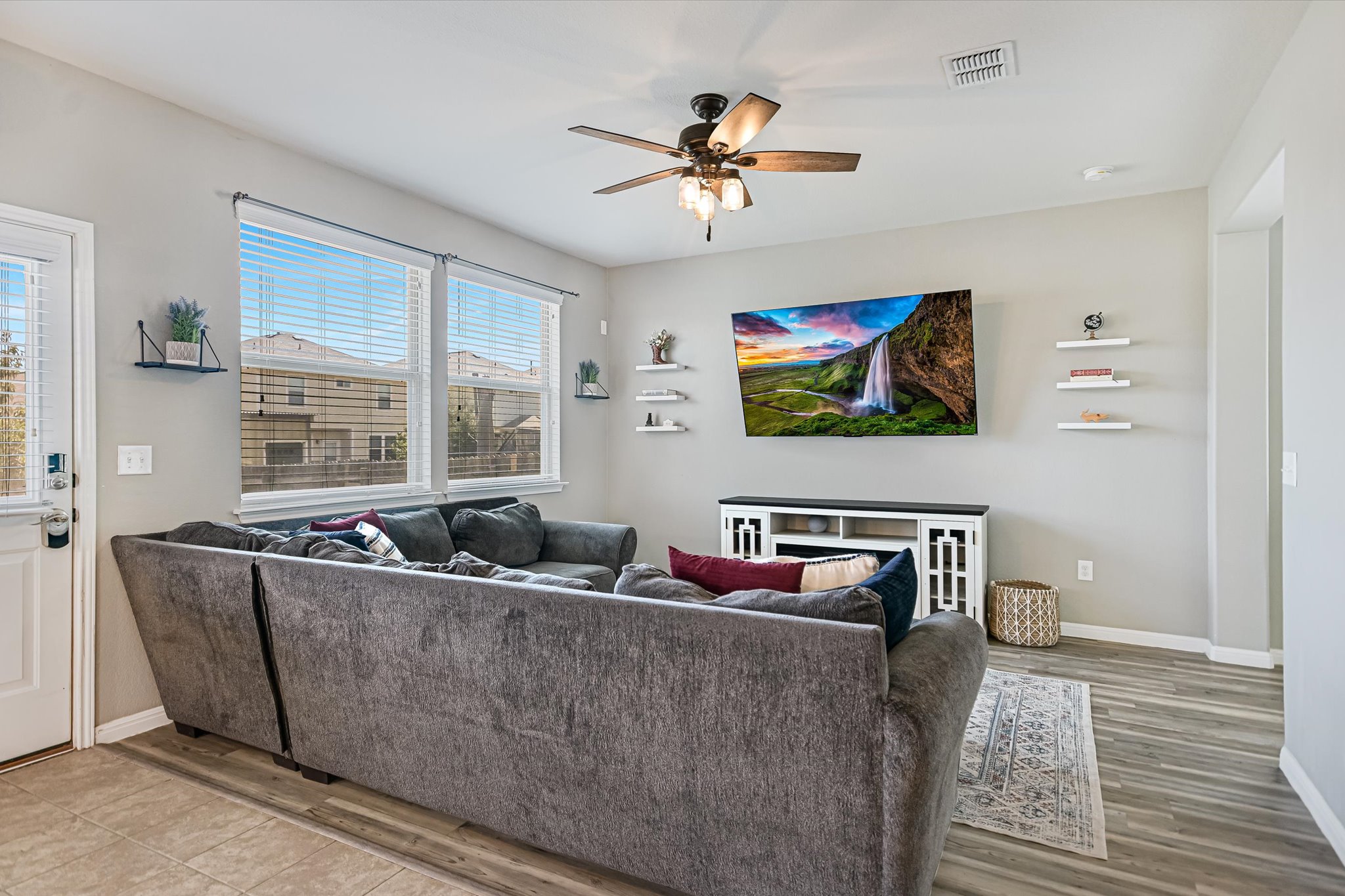 225 Vestral Road Buda, TX 78610 - Photo 5 of 24 With your big-screen TV as a natural focal point, it’s the perfect spot to settle in to catch your favorite Team's big game or simply unwind at the end of the day.