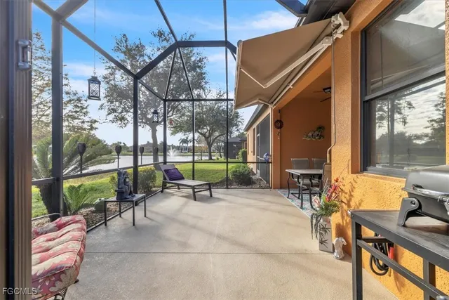 a building outdoor space with patio furniture and potted plants