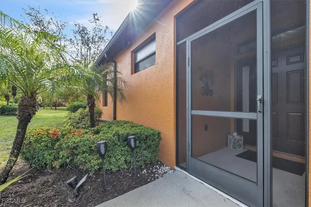 a view of backyard from the hallway