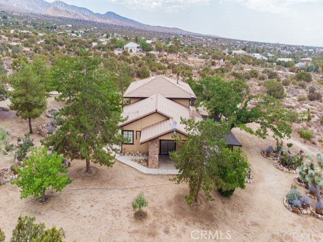 984 Pinon Road Pinon Hills, CA 92372 - Photo 2 of 45 an aerial view of a house with a yard