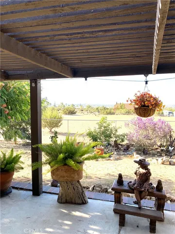 a view of swimming pool with outdoor seating