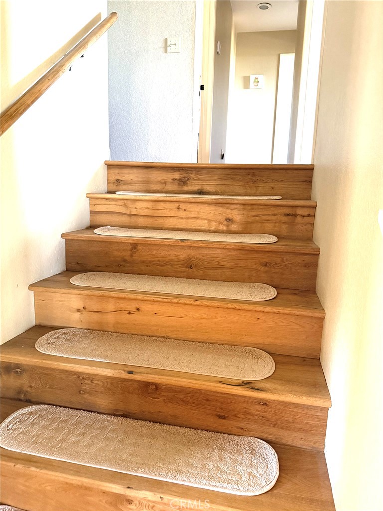 984 Pinon Road Pinon Hills, CA 92372 - Photo 8 of 45 a bathroom with a toilet and a mirror