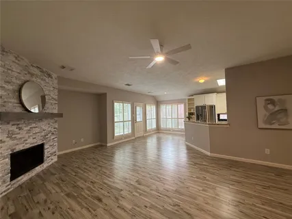 a view of livingroom and hardwood floor