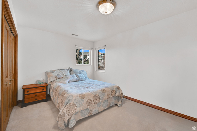 1085 Windsor Drive Provo, UT 84604 - Photo 51 of 83 Carpeted bedroom featuring a closet and baseboards