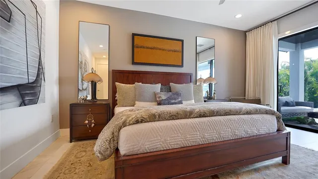 a bedroom with a bed and a couch