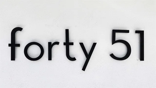 a close view of light fixtures and a mirror