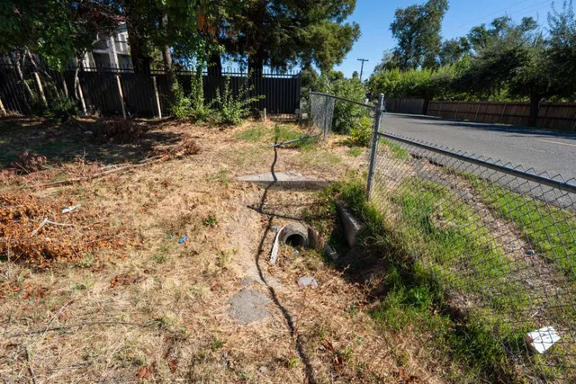 a backyard of a house with lots of green space