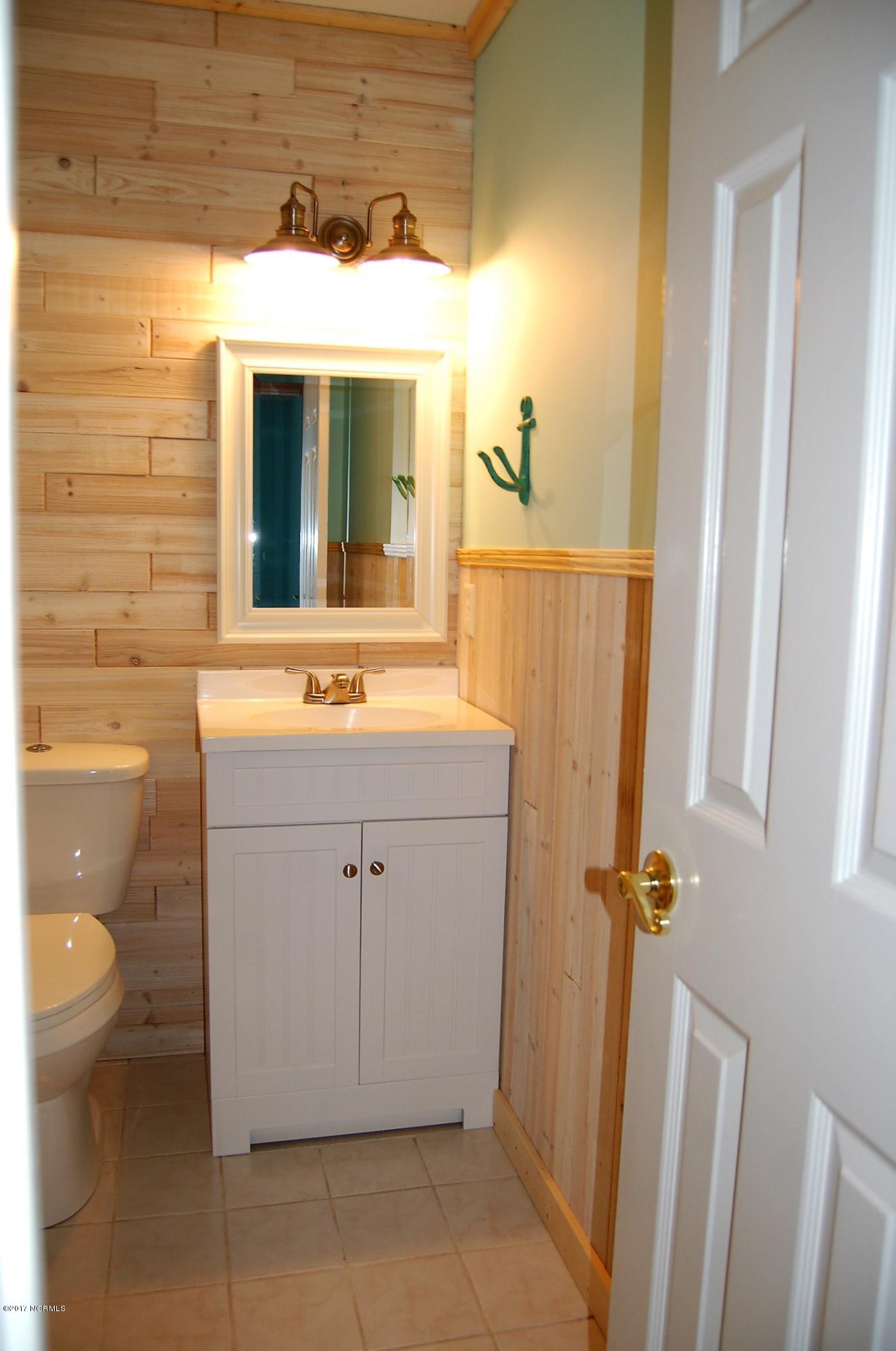 706 Stately Pines Road New Bern, NC 28560 - Photo 21 of 28 New Vanity and mirror