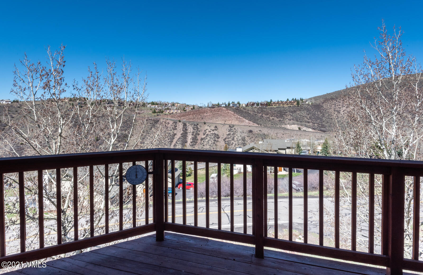 1082 West Wildwood Road, Unit C Avon, CO 81620 - Photo 26 of 30 a balcony with wooden floor and fence