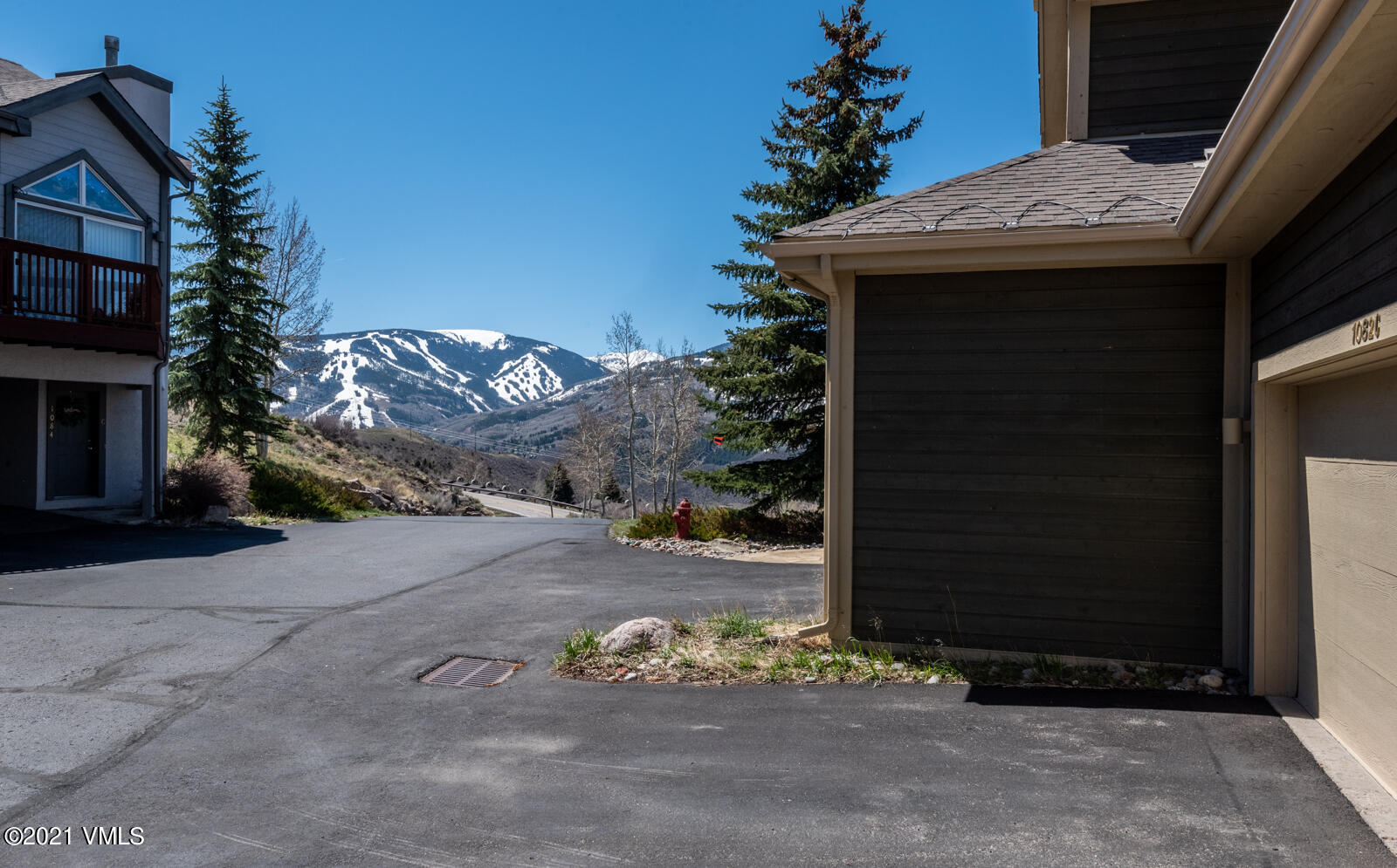 1082 West Wildwood Road, Unit C Avon, CO 81620 - Photo 29 of 30 a front view of a house with a yard