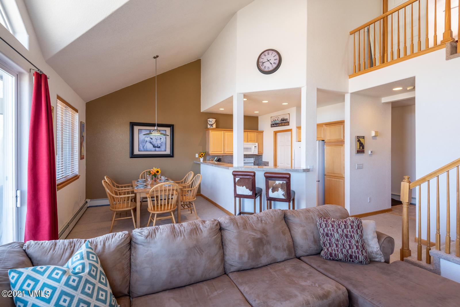 1082 West Wildwood Road, Unit C Avon, CO 81620 - Photo 7 of 30 a living room with furniture and large windows