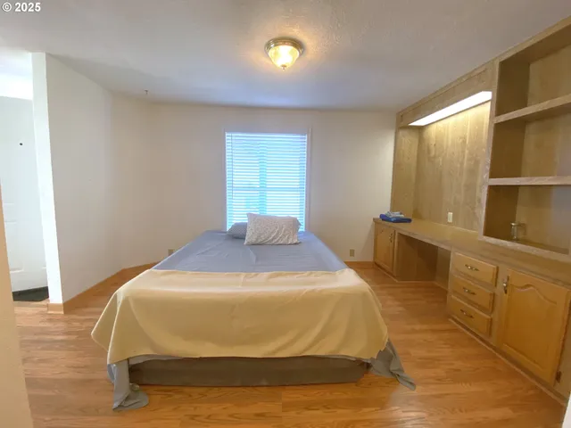 a bathroom with a sink toilet and mirror