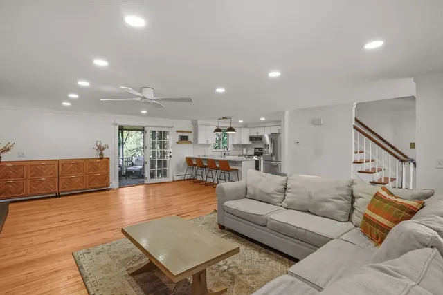 a living room with furniture and a table