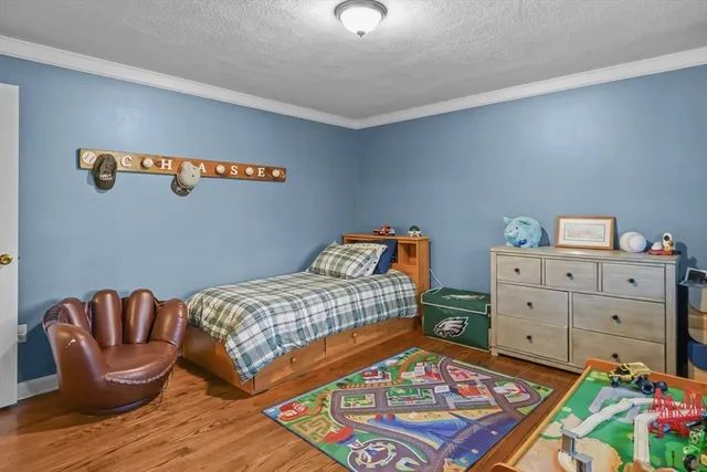 a bed room with a bed and a couch