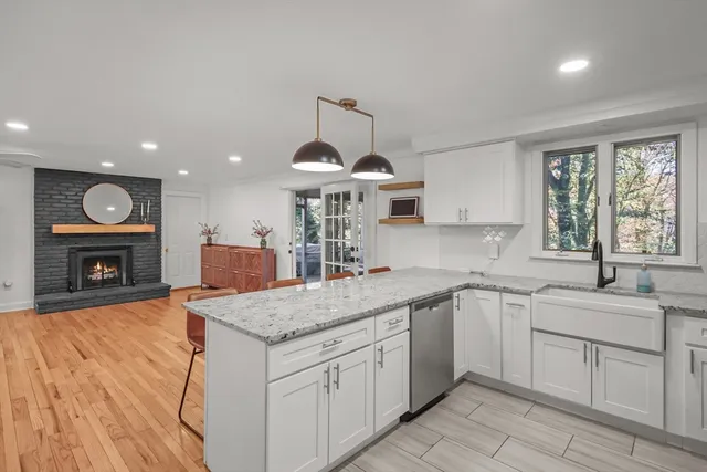 a kitchen with sink and window