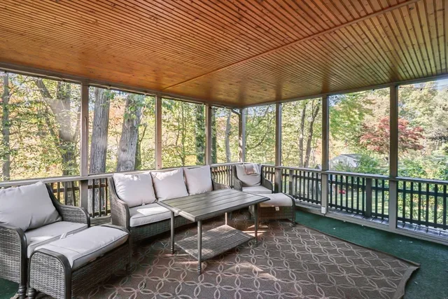 a outdoor living space with furniture and garden view