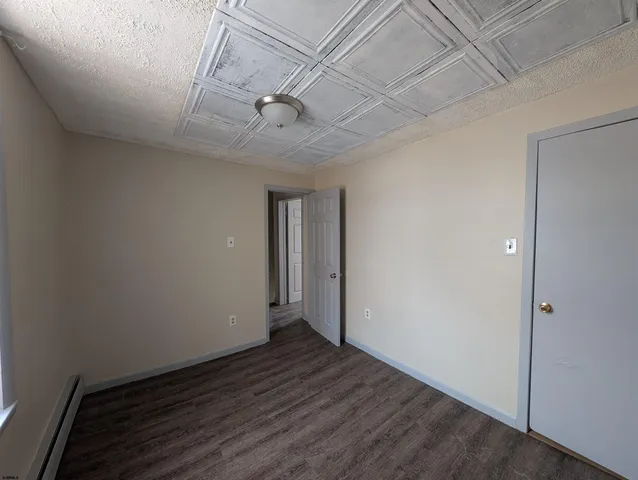 a bathroom with a toilet a sink and bathtub