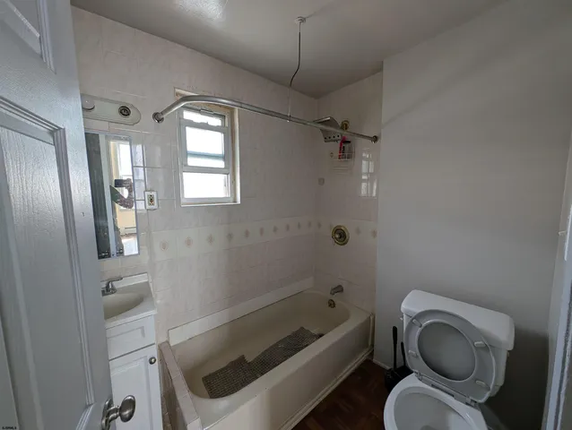 a view of entryway with a stairs