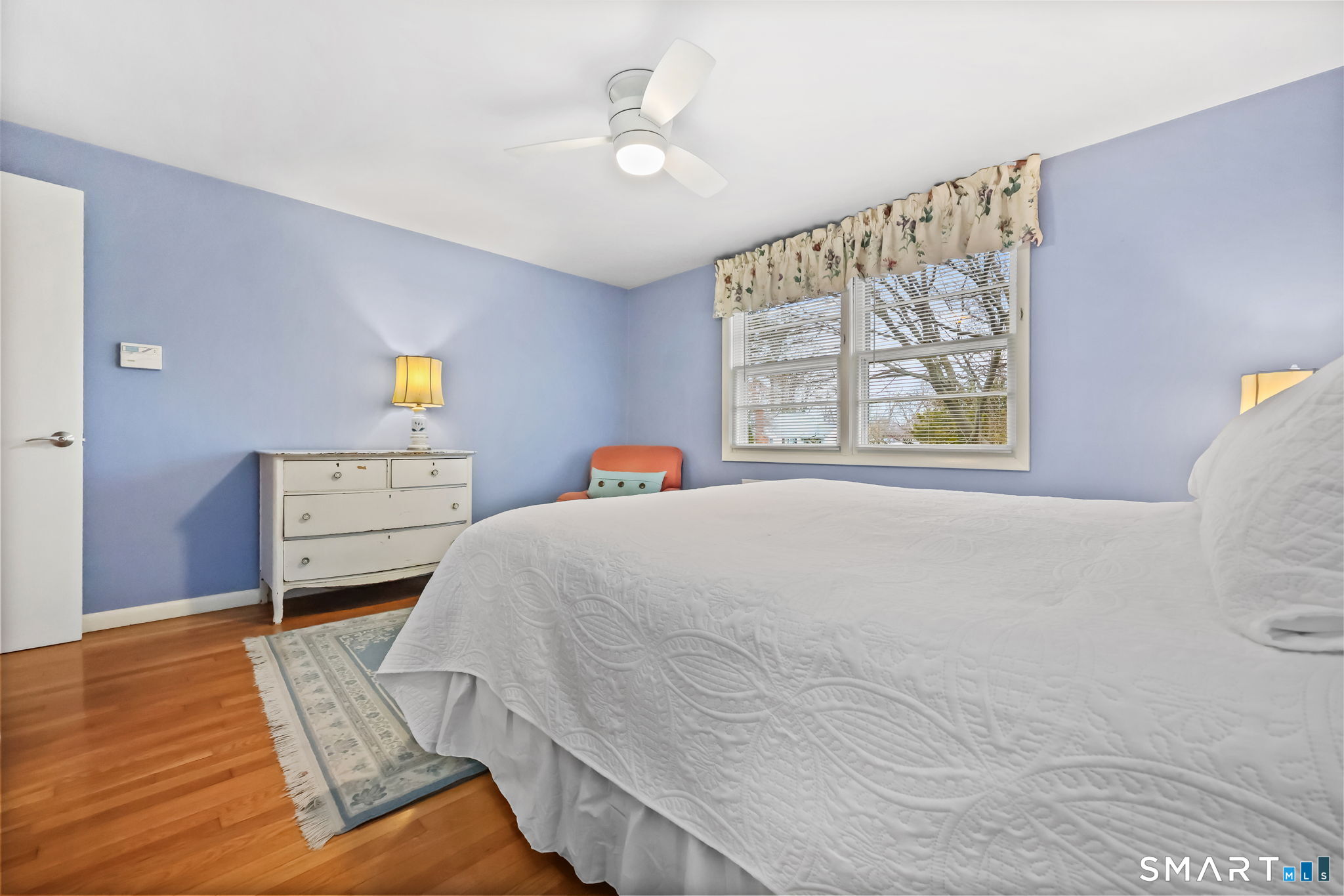 19 Lyncrest Drive Norwalk, CT 06851 - Photo 13 of 41 a bedroom with a bed and wooden floor