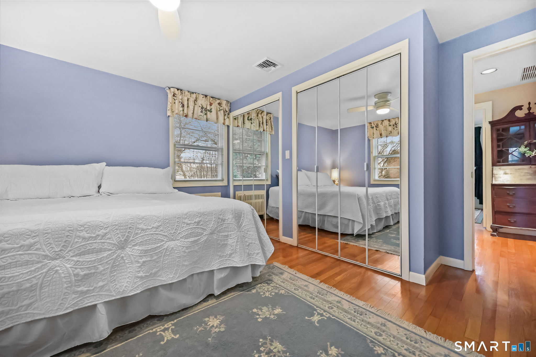19 Lyncrest Drive Norwalk, CT 06851 - Photo 14 of 41 a spacious bedroom with a bed and wooden floor