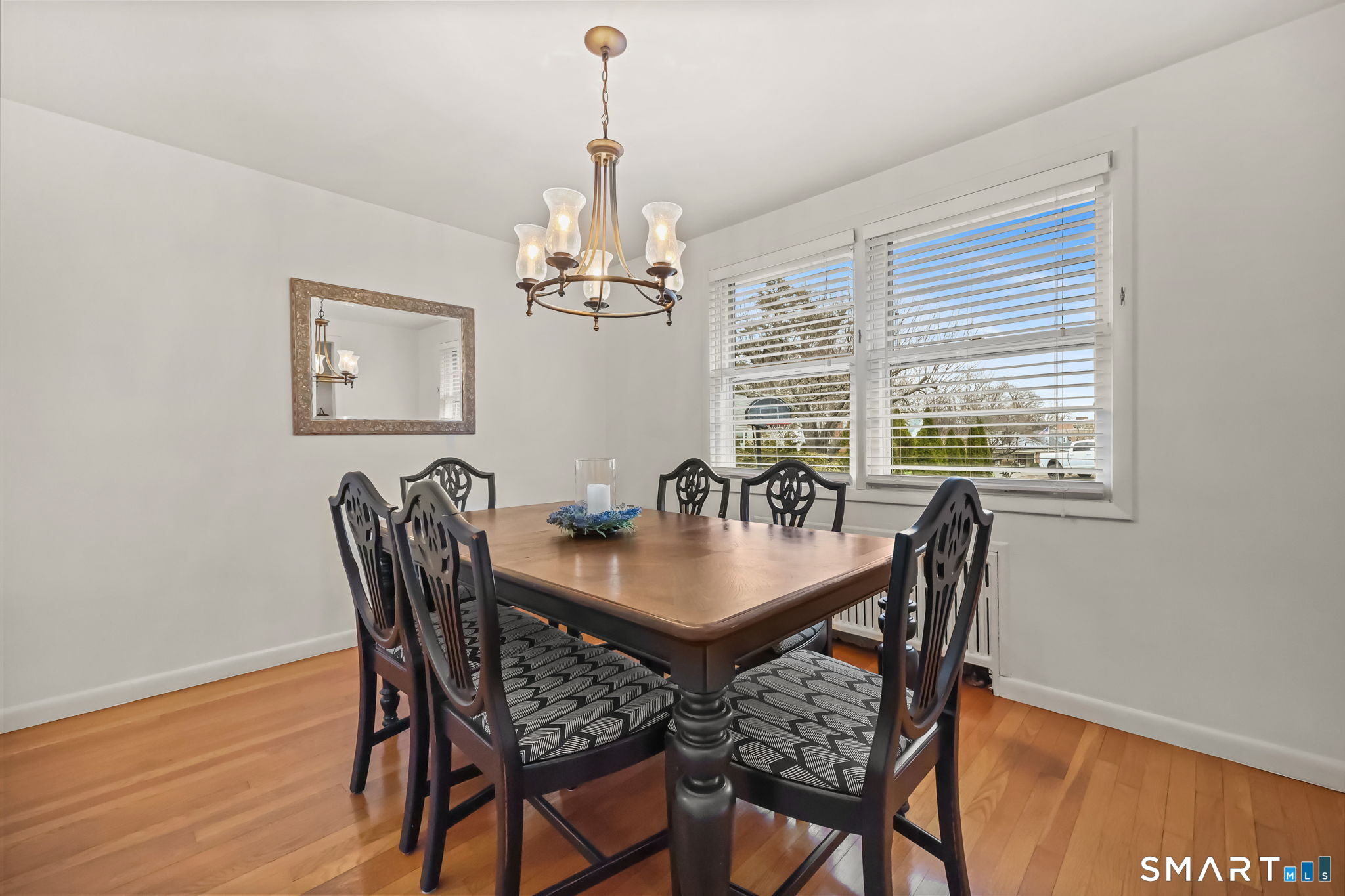 19 Lyncrest Drive Norwalk, CT 06851 - Photo 19 of 41 a view of a dining room with furniture window and wooden floor