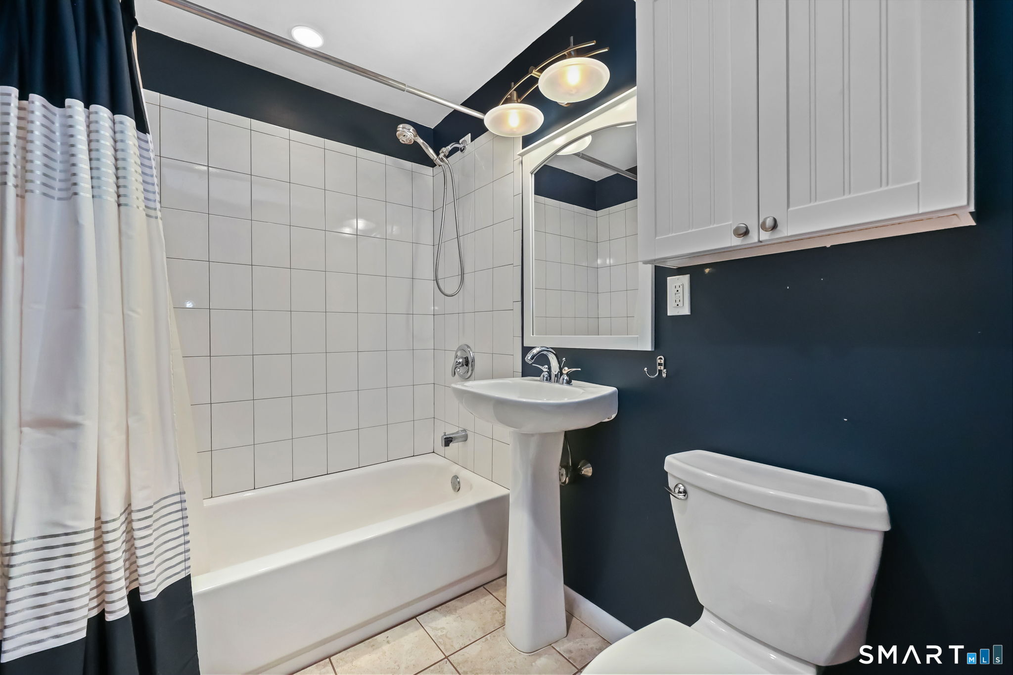 19 Lyncrest Drive Norwalk, CT 06851 - Photo 27 of 41 a bathroom with a toilet a sink and bathtub