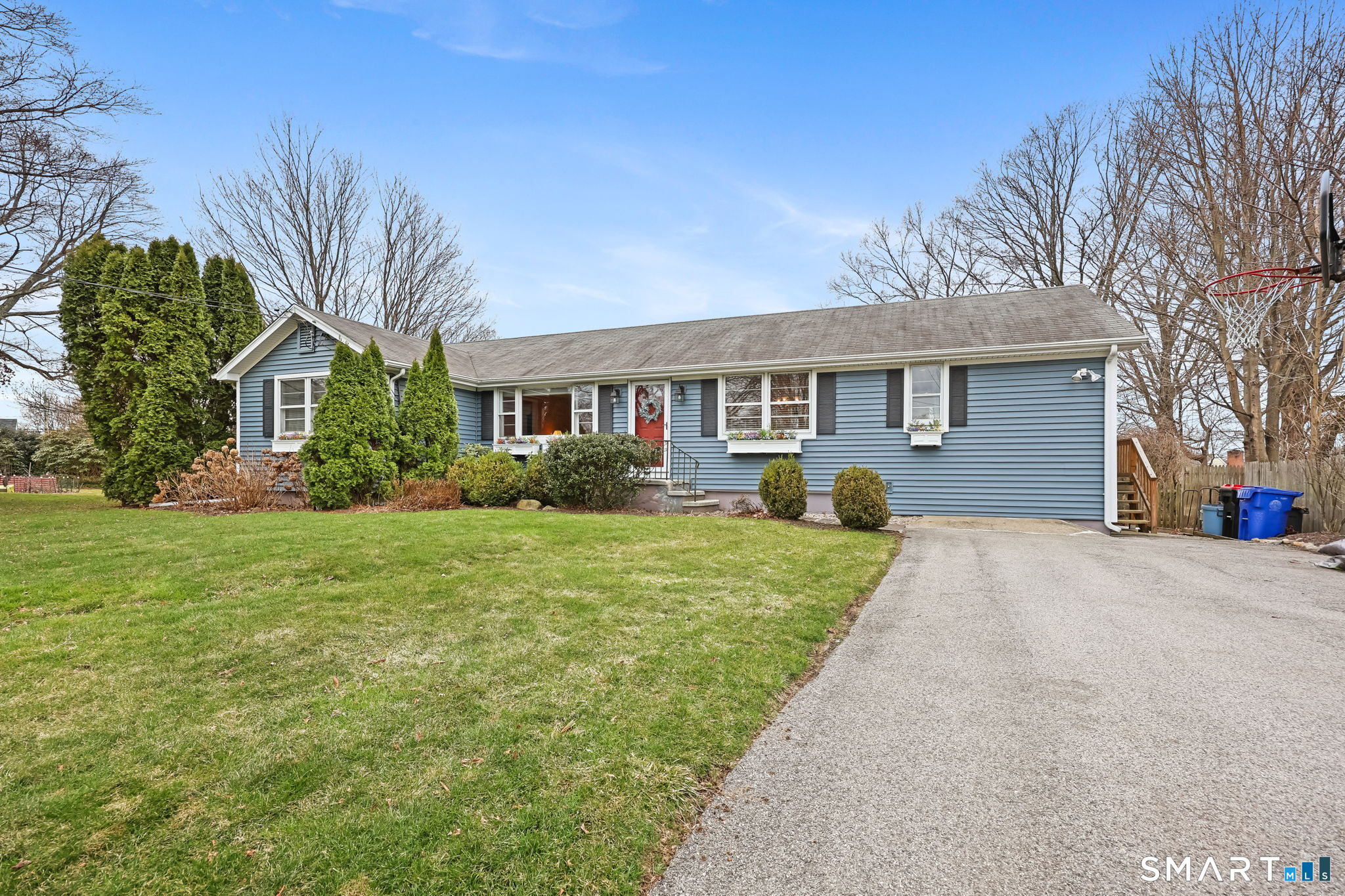 19 Lyncrest Drive Norwalk, CT 06851 - Photo 3 of 41 a front view of house with yard and green space